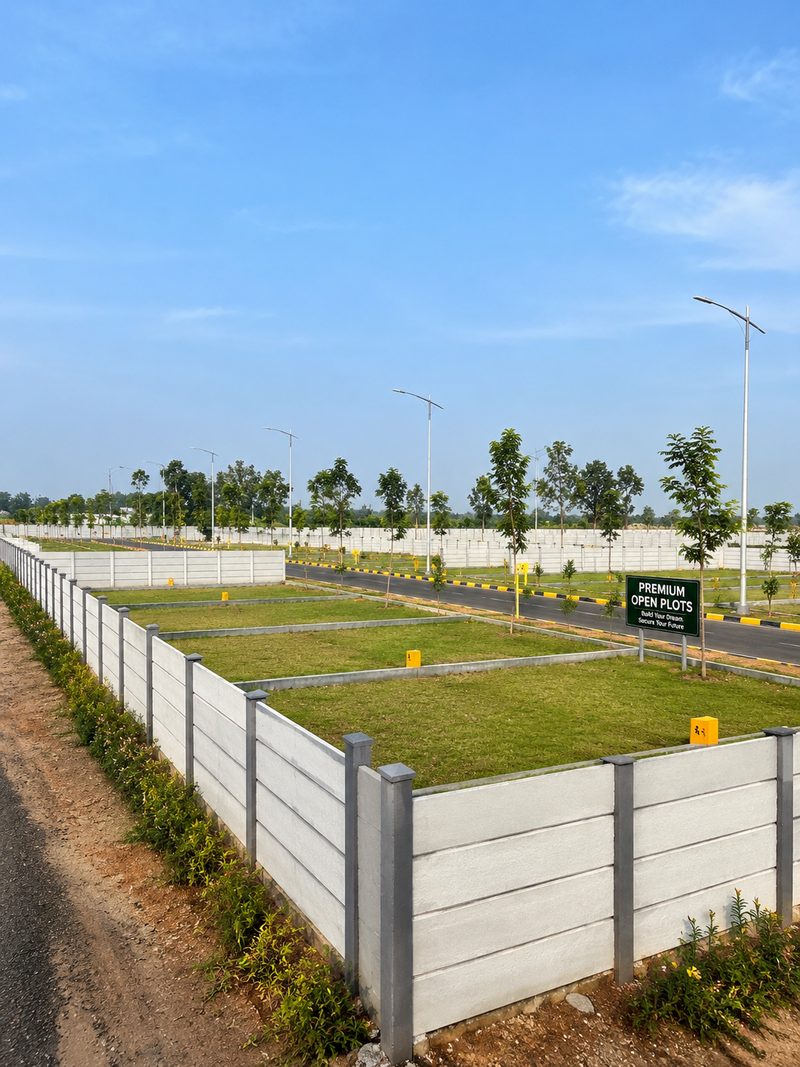 A plot boundary fenced and precast walled